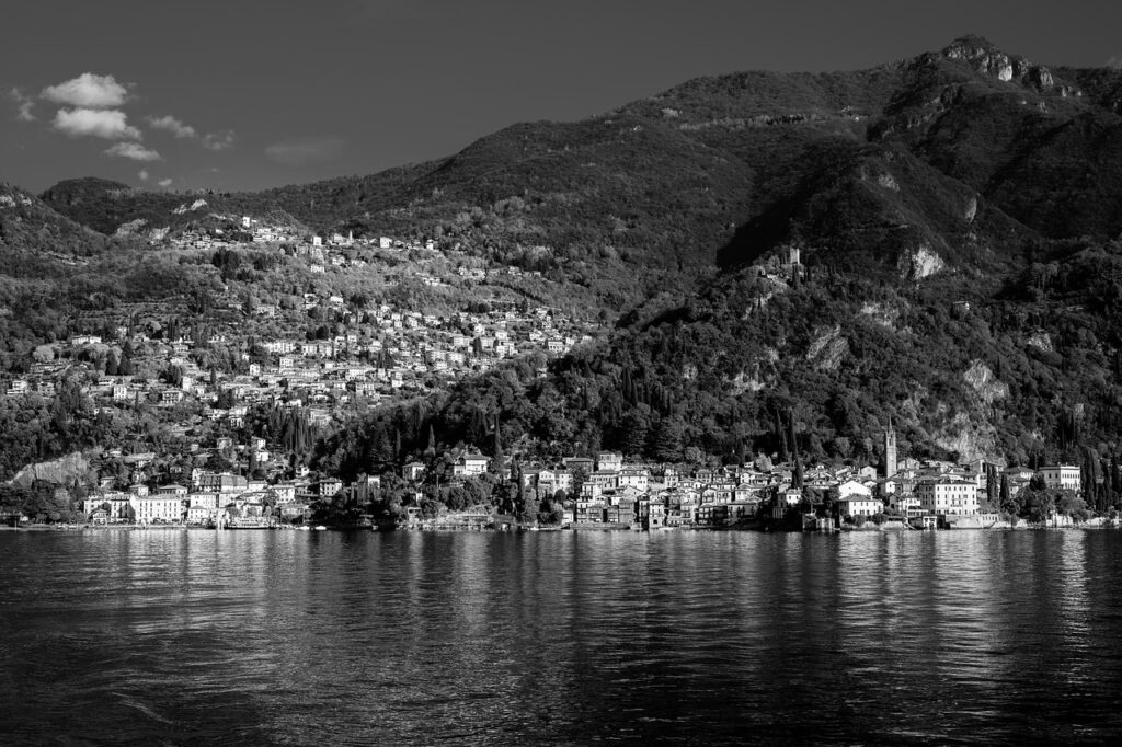 Drone shot in black and white of Lake Como and its countless wedding villas